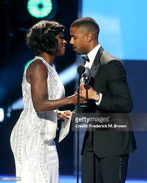 Actor Michael B. Jordan accepts the Entertainer of the Year award from actress Viola Davis onstage during the 47th NAACP Image Awards presented by TV...