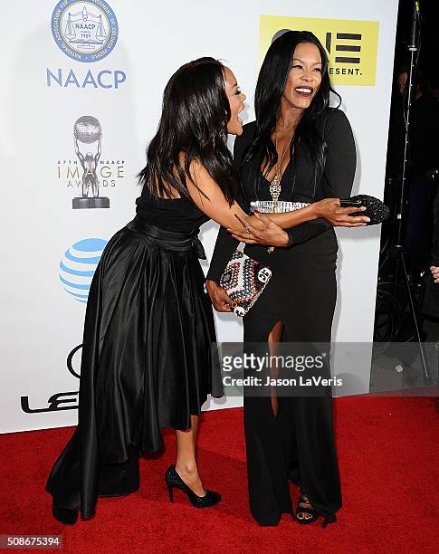Actresses Robin Givens and Golden Brooks attend the 47th NAACP Image Awards at Pasadena Civic Auditorium on February 5, 2016 in Pasadena, California.