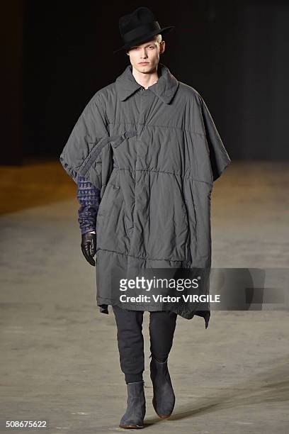 Model walks the runway at the Robert Geller show during New York Fashion Week Men's Fall/Winter 2016 on February 2, 2016 in New York City.