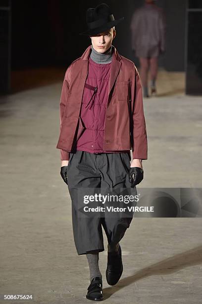 Model walks the runway at the Robert Geller show during New York Fashion Week Men's Fall/Winter 2016 on February 2, 2016 in New York City.