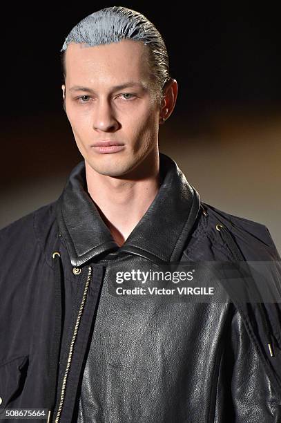 Model walks the runway at the Robert Geller show during New York Fashion Week Men's Fall/Winter 2016 on February 2, 2016 in New York City.