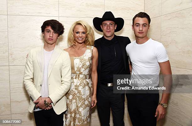 Dylan Lee, actress Pamela Anderson, filmmaker Luke Gilford and Brandon Lee attend the Los Angeles special screening and reception of "Connected" at...