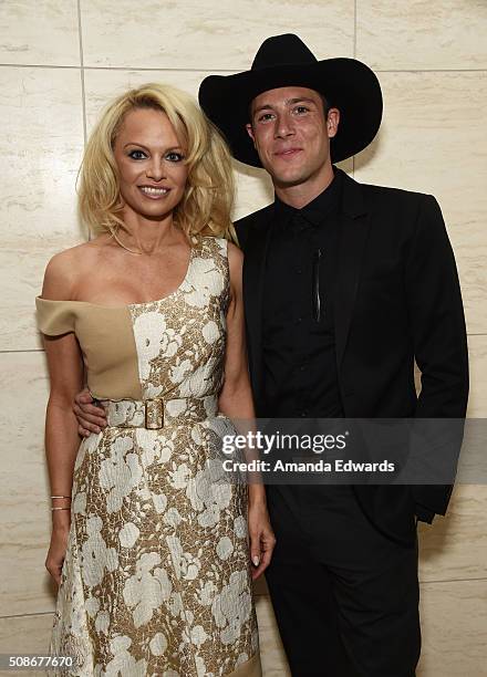 Actress Pamela Anderson and filmmaker Luke Gilford attend the Los Angeles special screening and reception of "Connected" at Milk Studios on February...