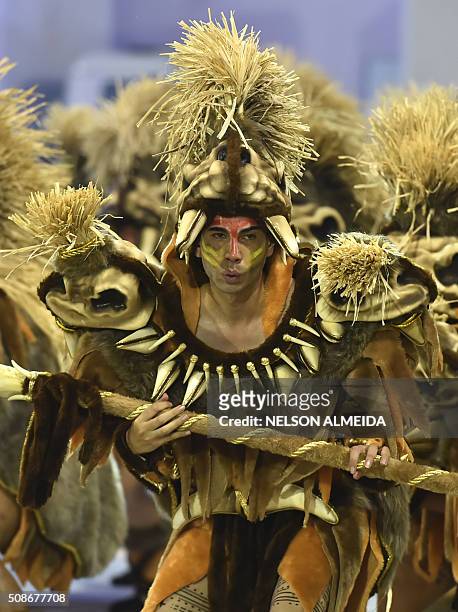 Revelers of the Rosas de Ouro samba school perform during the first night of the carnival parade at the Sambadrome in Sao Paulo, Brazil, on February...