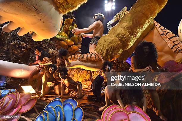 Revelers of the Rosas de Ouro samba school perform during the first night of the carnival parade at the Sambadrome in Sao Paulo, Brazil, on February...