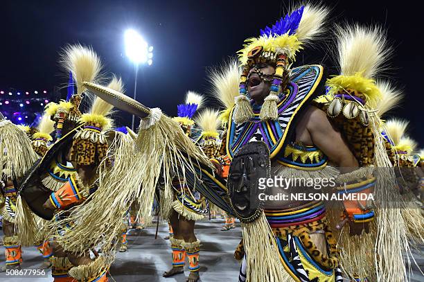 Revelers of the Rosas de Ouro samba school perform during the first night of the carnival parade at the Sambadrome in Sao Paulo, Brazil, on February...