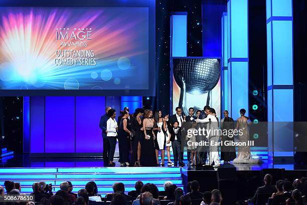 The cast and crew of "Black-ish" accept the Outstanding Comedy Series award onstage during the 47th NAACP Image Awards presented by TV One at...