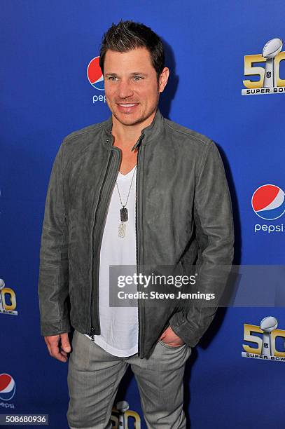 Personality/recording artist Nick Lachey walks the Blue Carpet at the 2015 Pepsi Rookie of the Year Award Ceremony at Pepsi Super Friday Night at...