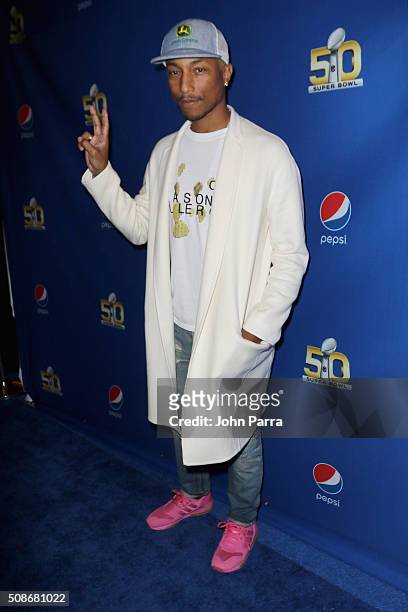 Winning artist Pharrell arrives at Pepsi Super Friday Night at Pier 70 on February 5, 2016 in San Francisco, California.