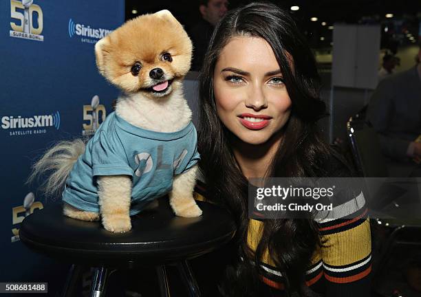 Model Adriana Lima and Jiffpom visit the SiriusXM set at Super Bowl 50 Radio Row at the Moscone Center on February 5, 2016 in San Francisco,...