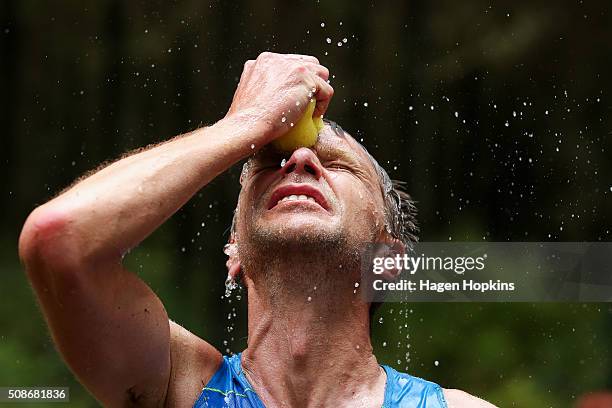 Jonas Buud of Sweden cools off during the Tarawera Ultramarathon on February 6, 2016 in Rotorua, New Zealand.