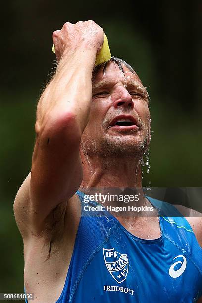 Jonas Buud of Sweden cools off during the Tarawera Ultramarathon on February 6, 2016 in Rotorua, New Zealand.