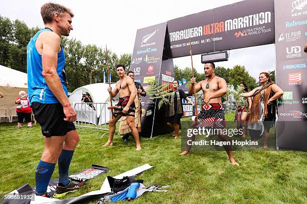 Jonas Buud of Sweden watches a haka after winning the Tarawera Ultramarathon on February 6, 2016 in Rotorua, New Zealand.