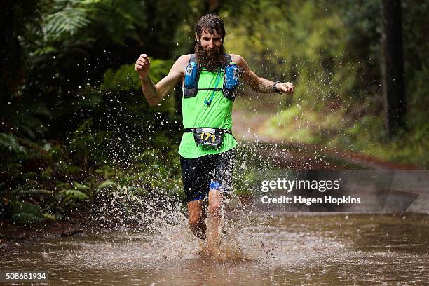 An athlete runs through water during the Tarawera Ultramarathon on February 6, 2016 in Rotorua, New Zealand.