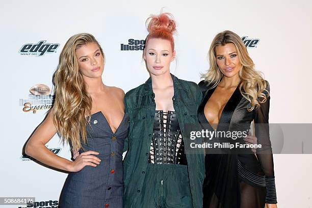 Model Nina Agdal, rapper Iggy Azalea, and model Samantha Hoopes attend the Sports Illustrated Experience Friday Night Party on February 5, 2016 in...