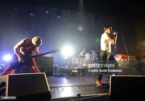 Musicians Flea, Chad Smith, Josh Klinghoffer and Anthony Kiedis of the Red Hot Chili Peppers perform onstage during the "Feel the Bern" fundraiser...
