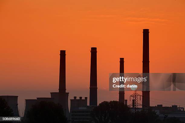 sunrise scenic of power plant - district heating plant stock-fotos und bilder