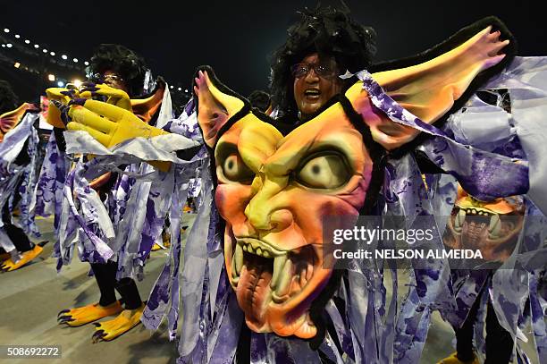 Revelers of the Rosas de Ouro samba school perform during the first night of the carnival parade at the Sambadrome in Sao Paulo, Brazil, on February...