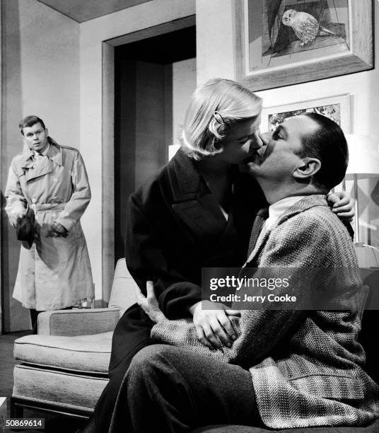 Barbara Bel Geddes, Barry Nelson, and Donald Cook acting out a dramatic moment in the show "The Moon is Blue."