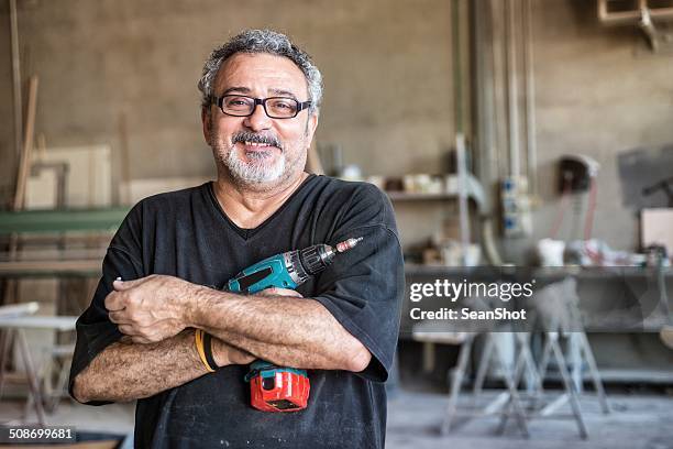 pessoas reais-trabalhador com broca - broca imagens e fotografias de stock