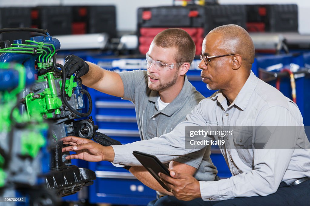 Vocational class, learning to repair diesel engine