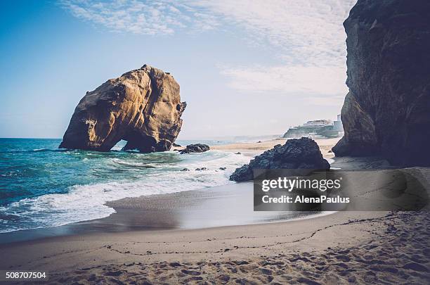 penedo do guincho - santa cruz beach rock - beach stone stock pictures, royalty-free photos & images