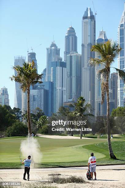 Gary Stal of France plays on to the 12th green during the third round of the Omega Dubai Desert Classic at the Emirates Golf Club on February 6, 2016...