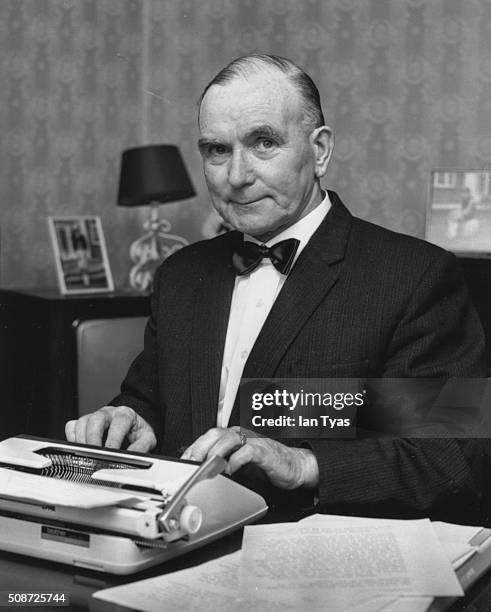 Portrait of British executioner Albert Pierrepoint writing his memoirs, 1973.