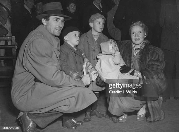 Actor Gregory Peck and his wife Veronique Passani with their children Stephen, Jonathan and Carey, pictured at Waterloo Station after arriving on the...