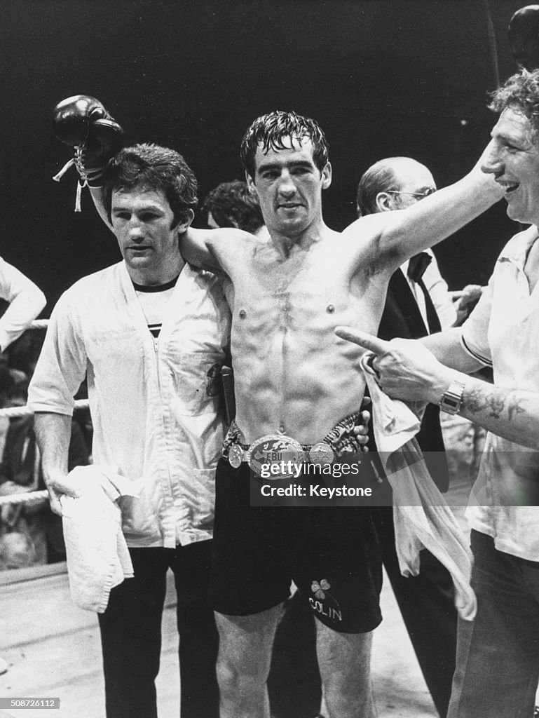 Colin Boxer British boxer Colin Powers raising his arms in victory after beating ...