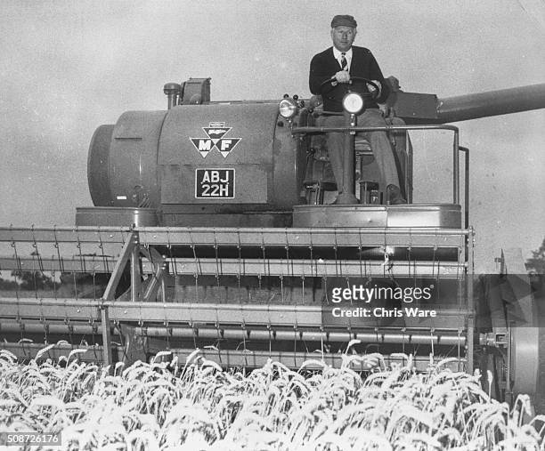 Jim Prior, the Minister of Agriculture and Fisheries, driving a combine harvester on his farm in Brampton, Suffolk, August 17th 1970.