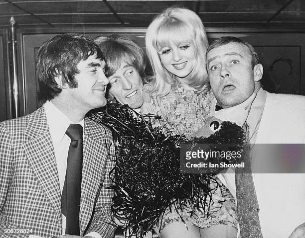 Stars appearing in the pantomime 'Babes in the Wood'; Derek Nimmo, Rod Hull and his puppet Emu, Adrienne Posta and Edward Woodward, at the London...