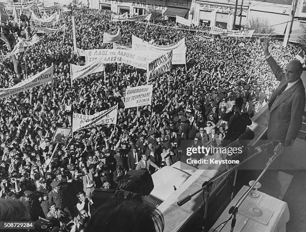 Politician Konstantinos Karamanlis waving from a balcony following the fall of the Greek military Junta, during a political rally, 1974.
