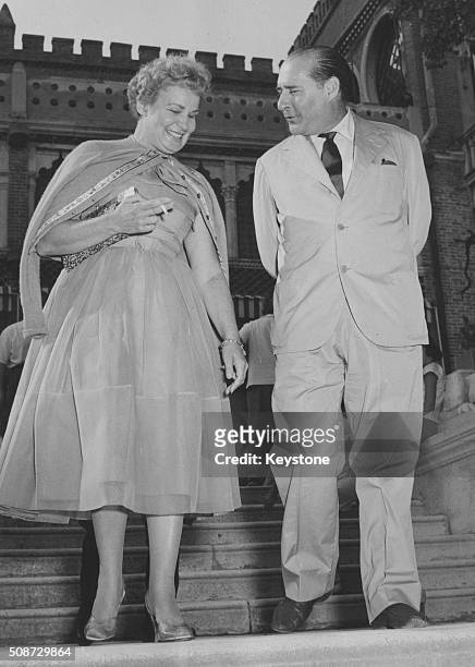 Director Roberto Rossellini and actress Shirley Booth pictured attending the International Film Festival in Milan, September 10th 1956.