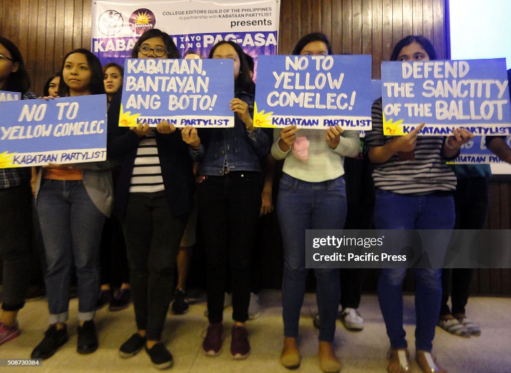 Filipino activists hold placards calling for clean and...