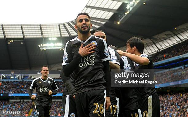 Riyad Mahrez of Leicester City celebrates scoring his team's second goal during the Barclays Premier League match between Manchester City and...