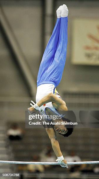 Hisashi Mizutori competes in the High Bar during day two of the Artistic Gymnastics NHK Trophy at the Sun Dome Fukui on July 9, 2005 in Fukui, Japan.