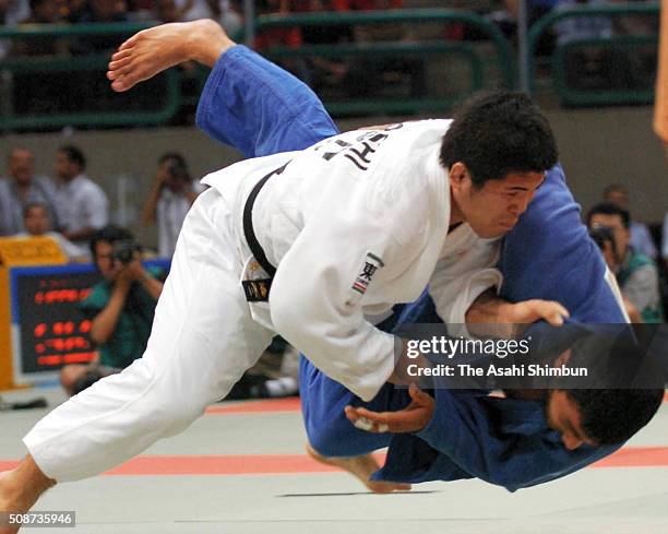 Hiroshi Izumi of Japan throws Ilias Iliadis of Greece during the Men's -90kg final during day two of the World Judo Championships at the Cairo...