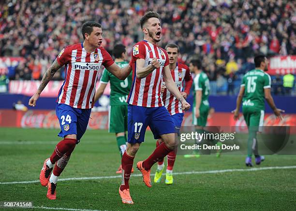 Saul Niguez of Club Atletico de Madrid celebrates with Jose Maria Gimenez after scoring his team's 2nd goal during the La Liga match between Club...