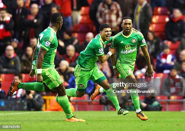 Jermain Defoe of Sunderland celebrates scoring his team's second goal with his team mates DeAndre Yedlin and Lamine Kone during the Barclays Premier...
