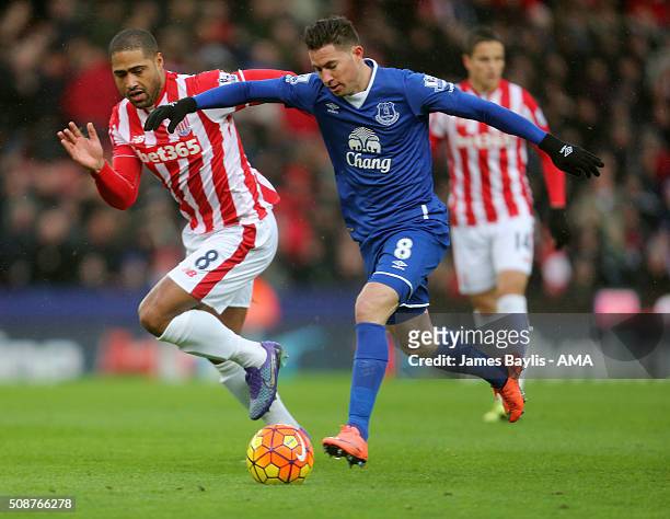 Bryan Oviedo of Everton and Glen Johnson of Stoke City during the Barclays Premier League match between Stoke City and Everton at the Britannia...