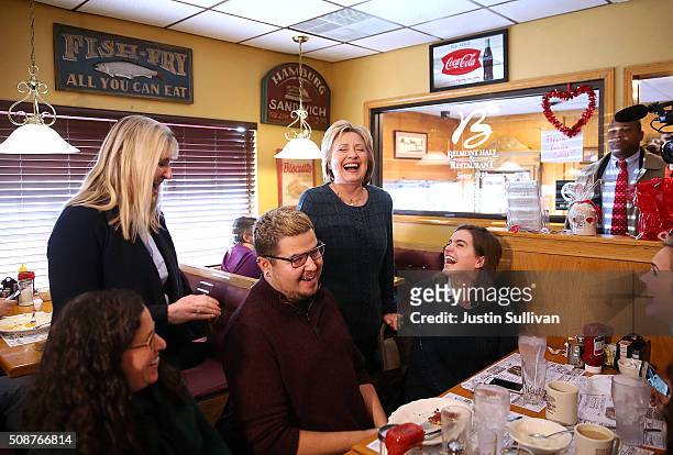 Democratic presidential candidate former Secretary of State Hillary Clinton greets patrons at Belmont Hall and Restaurant on February 6, 2016 in...