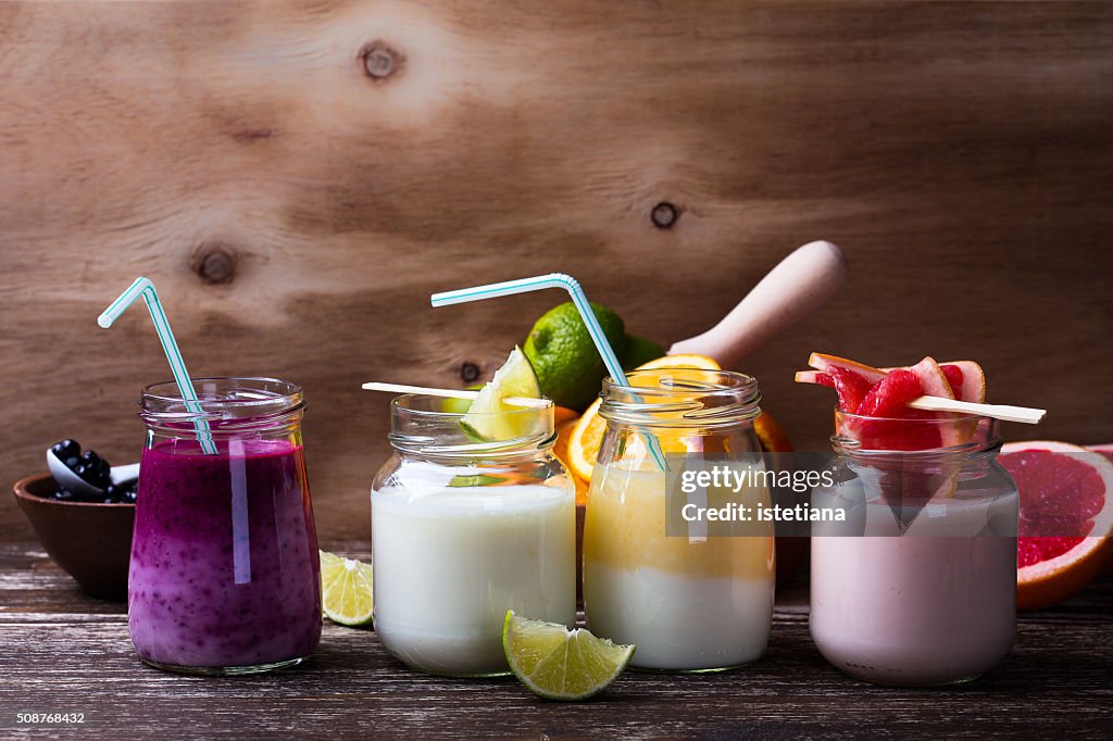 Homemade yogurt with  fresh organic blueberries, lime juice, orange and grapefruit. Berry smoothie bar