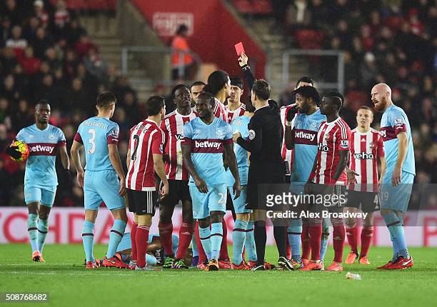 Victor Wanyama of Southampton is shown a red card and is sent off by referee Mark Clattenburg during the Barclays Premier League match between...