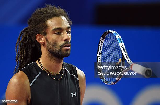 Germany's Dustin Brown reacts during his semi-final tennis match against France's Richard Gasquet at the Open Sud de France ATP World Tour in...