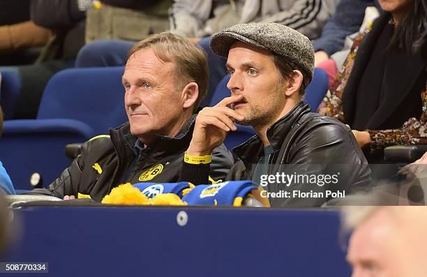 Hans-Joachim Watzke and coach Thomas Tuchel of Borussia Dortmund during the game between Alba Berlin and the MHP Riesen Ludwigsburg on february 6,...