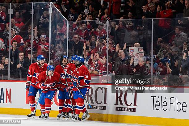 Brendan Gallagher of the Montreal Canadiens celebrates his goal with teammates during the NHL game against the Edmonton Oilers at the Bell Centre on...