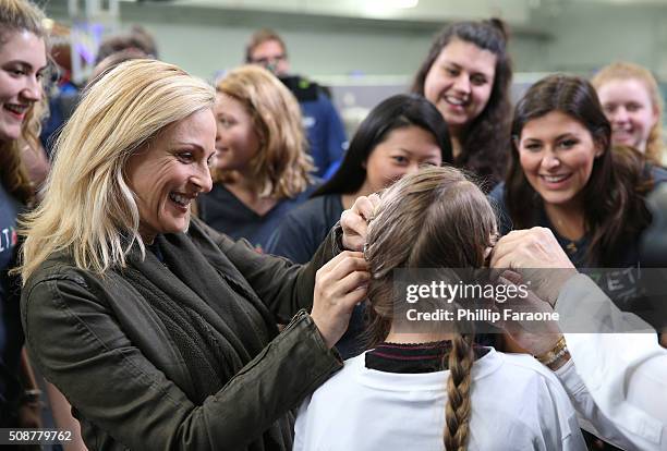 Actress Marlee Matlin helps patient Cassie during the Starkey Hearing Foundation hearing mission during Super Bowl weekend 2016 at San Francisco...