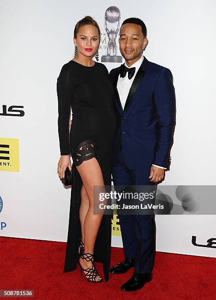 Chrissy Teigen and John Legend attend the 47th NAACP Image Awards at Pasadena Civic Auditorium on February 5, 2016 in Pasadena, California.