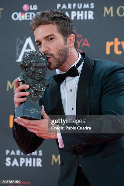 Pablo Alboran holds the award for best original song during the 30th edition of the Goya Cinema Awards at Madrid Marriott Auditorium on February 6,...
